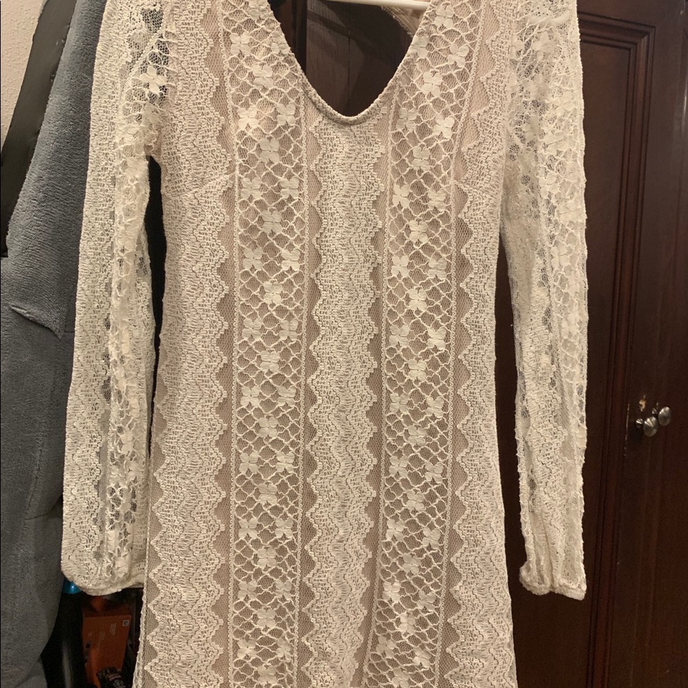 Speechless Dress in the colors beige and cream.